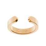 Close-up of the gold Omlezo Copper Magnetic Ring in a product display