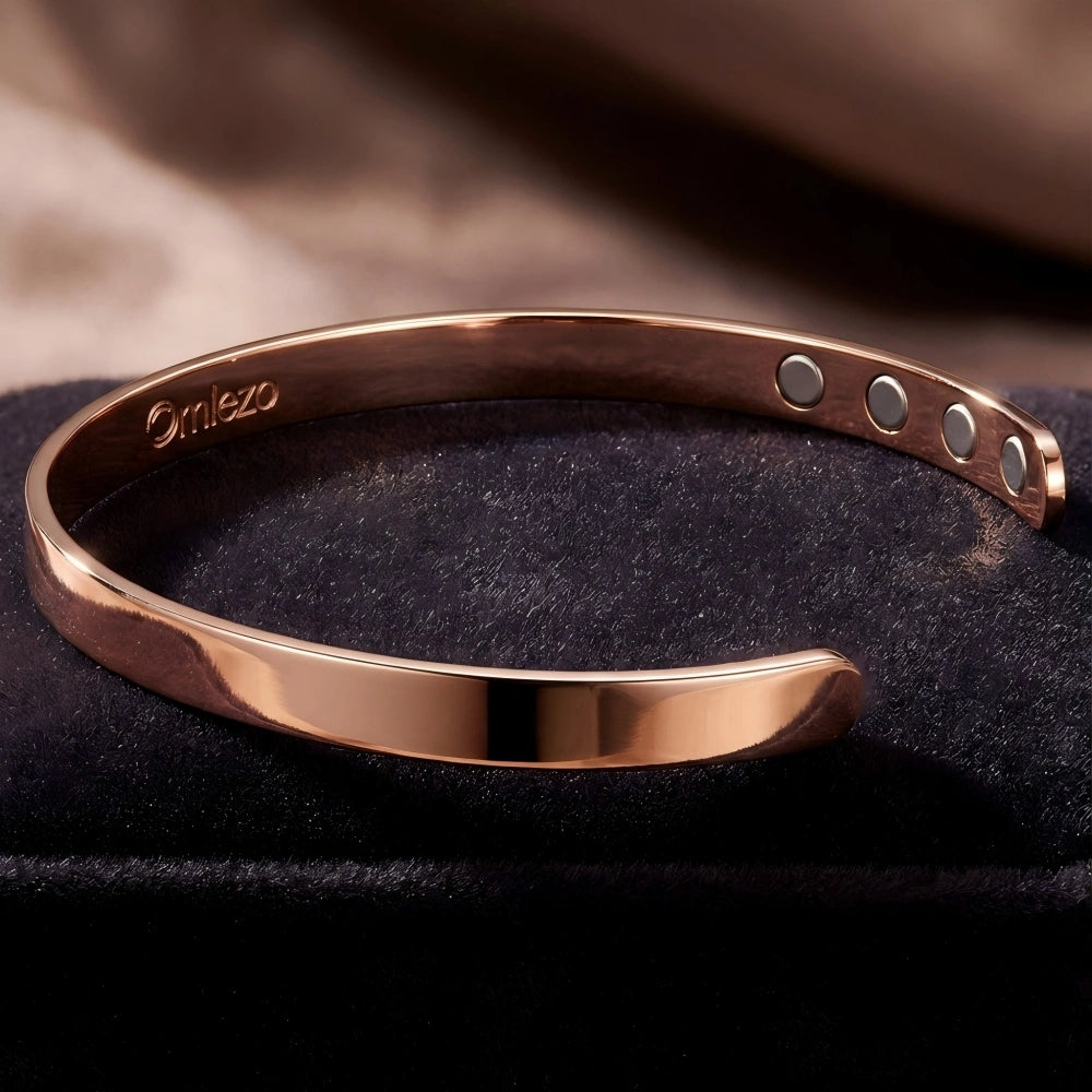 Omlezo rose gold magnetic copper bracelet on velvet background