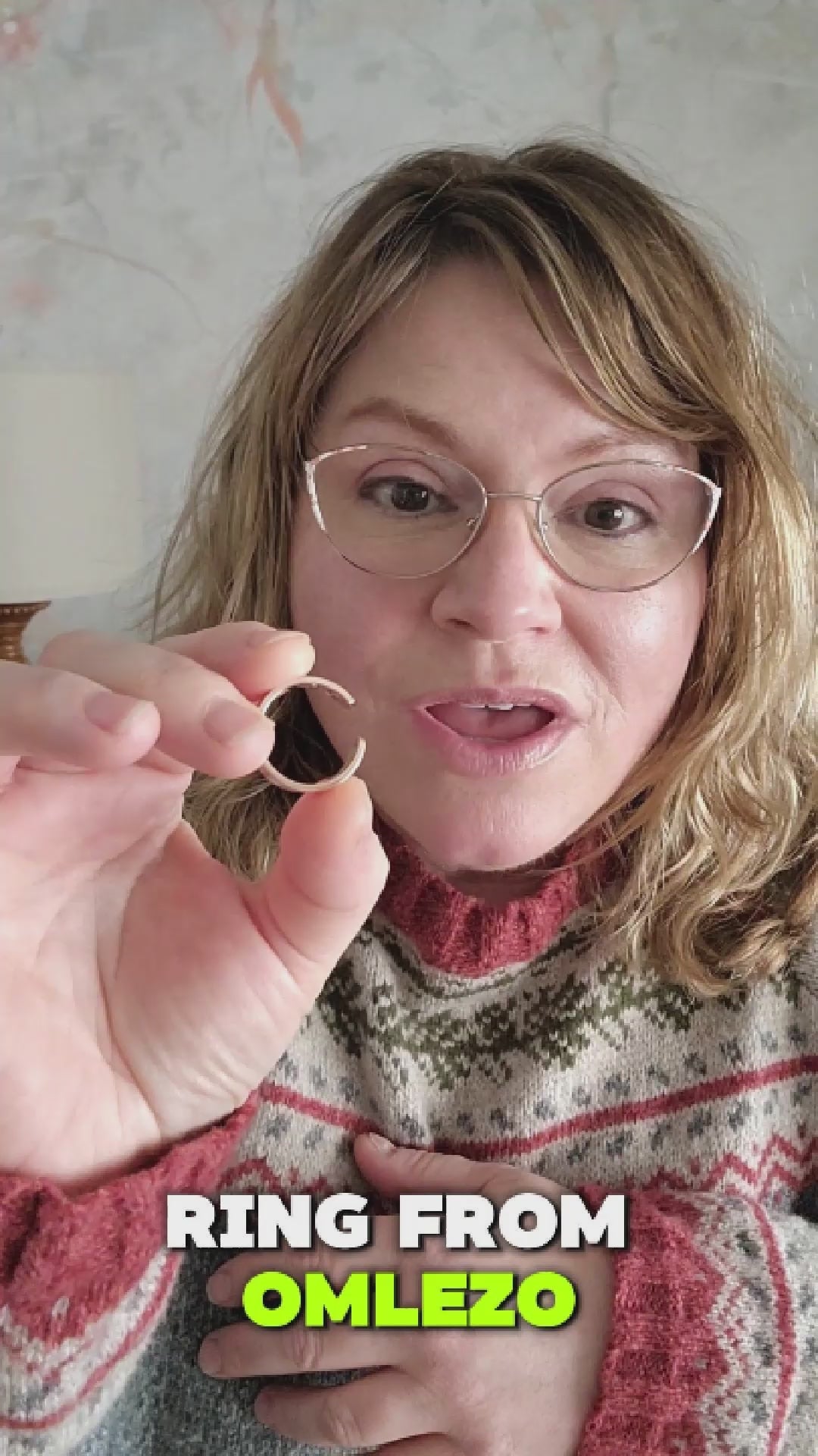 Influencer showcasing Omlezo rose gold magnetic copper ring in a lifestyle video