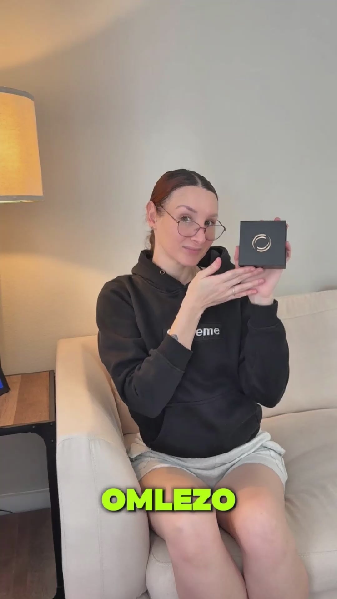 Influencer showcasing Omlezo gold magnetic copper ring in a lifestyle video